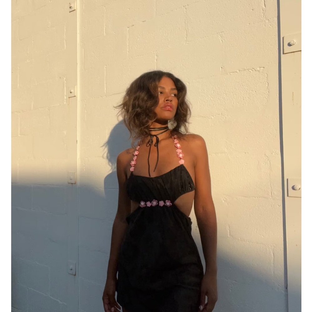 Elegant Black Dress with Pink Accents